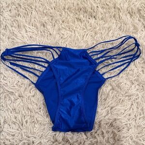 NWT VTG 2014 Victoria’s Secret Blue Strappy Cheekini Small
